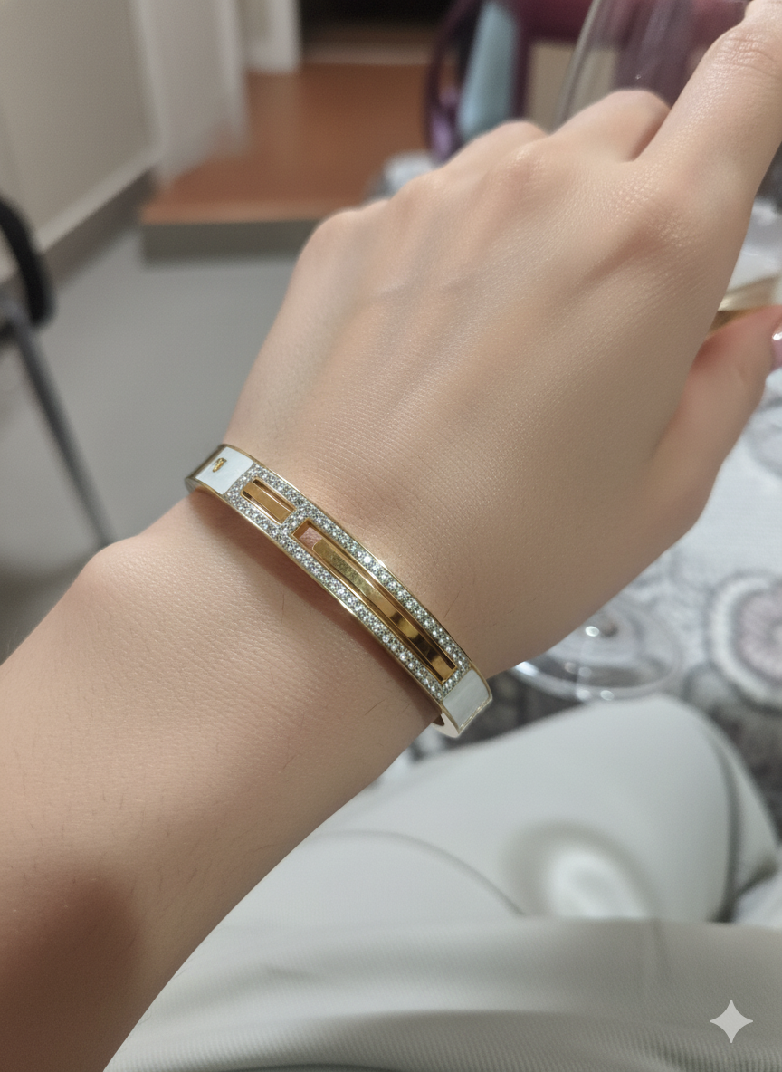 American diamond-studded stainless steel bangle-style bracelet